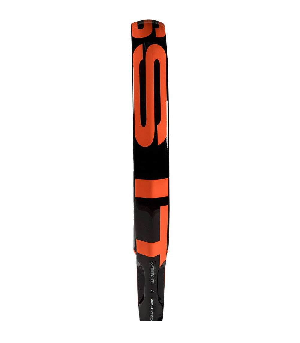 The side of a black and orange Adidas padel tennis racket.