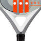 Close up of grey Adidas padel tennis racket with orange stripes on a white background.
