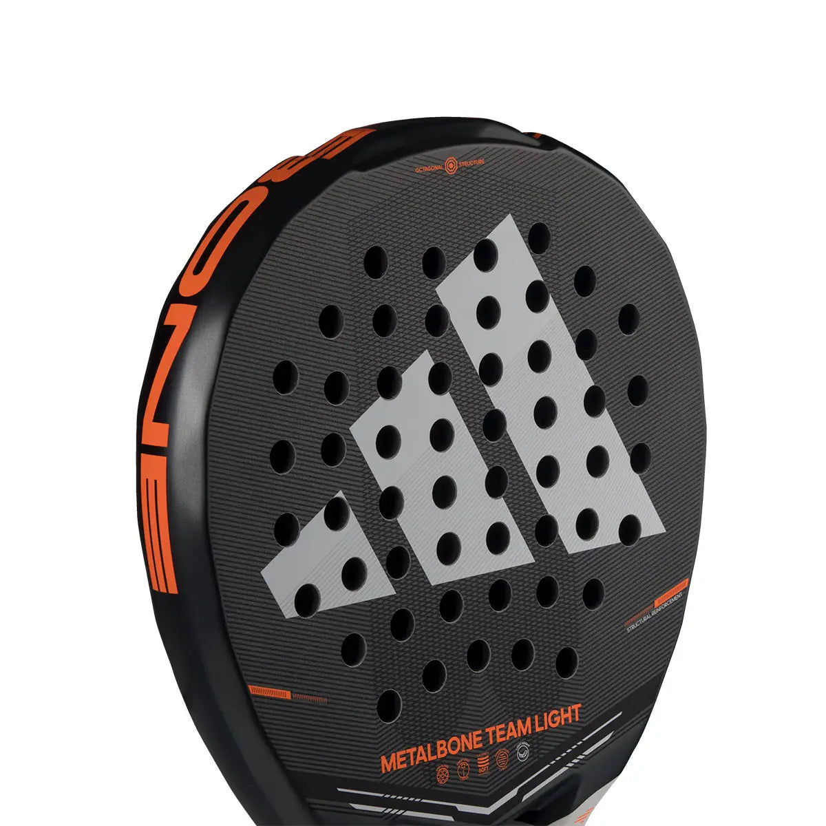 The face of a black Adidas Metalbone padel racket with orange branding on a white background.