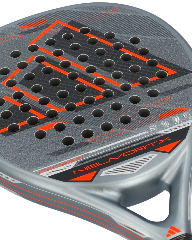 Close up of a black, orange and grey Adidas padel racket on a white background.