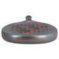 The top of a black, orange and grey Adidas padel racket on a white background.
