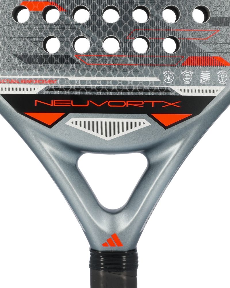 A close up of a black, orange and grey Adidas padel racket on a white background.