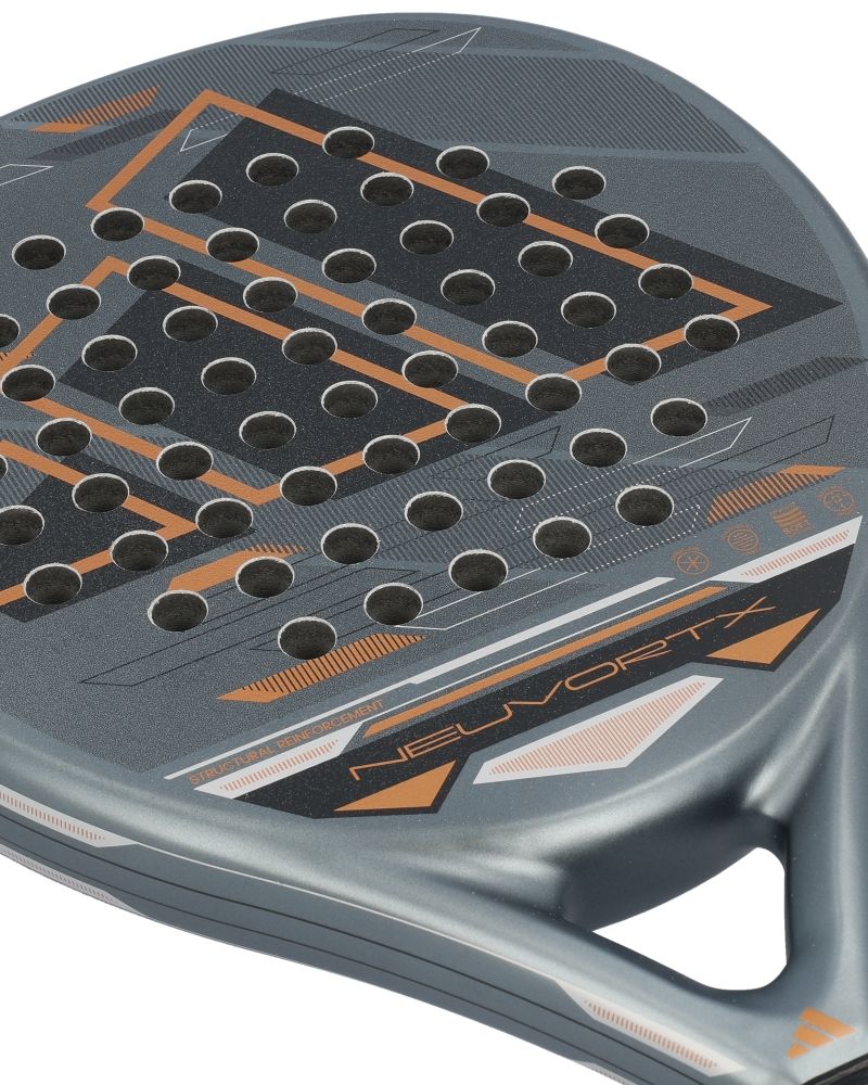 Close up of a grey and orange Adidas padel racket on a white background.