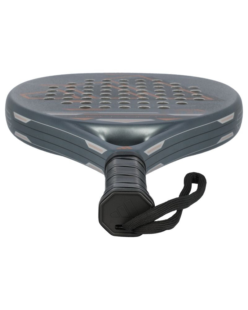 Handle of a grey and orange Adidas padel racket on a white background.