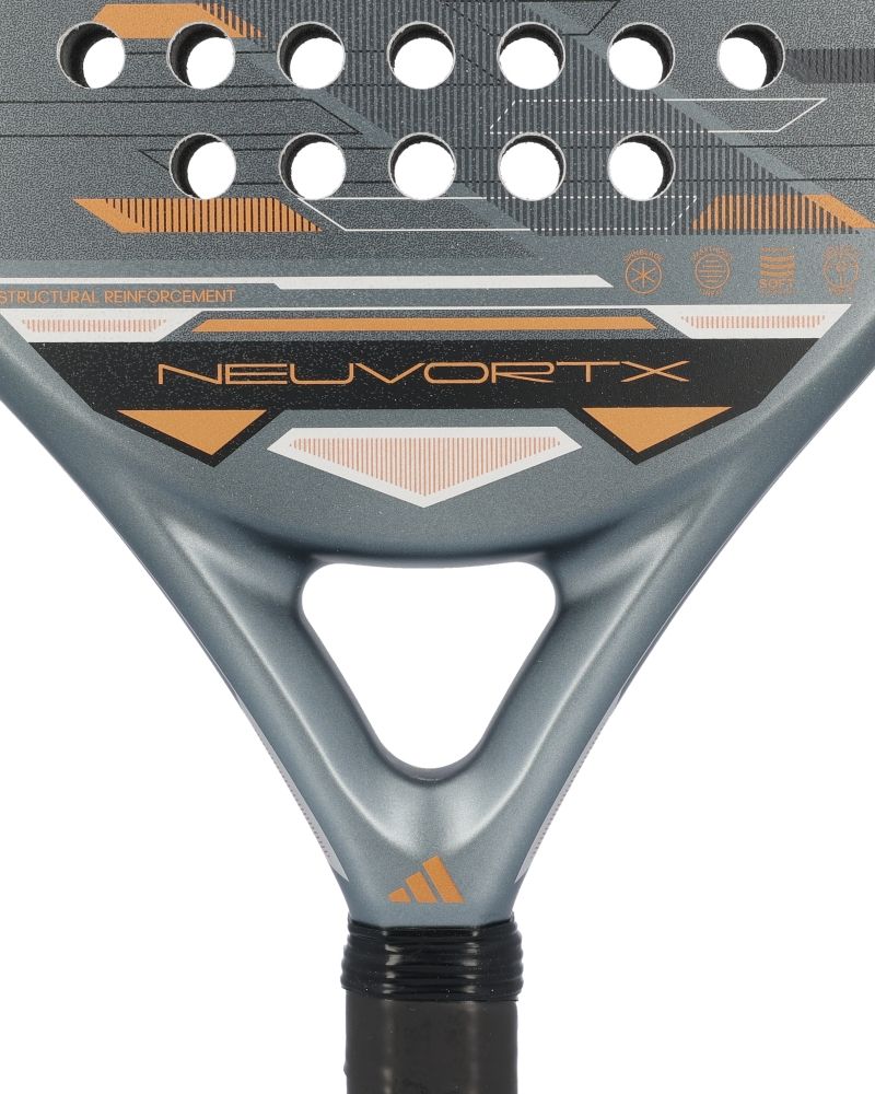 Close up of a grey and orange Adidas padel racket on a white background.