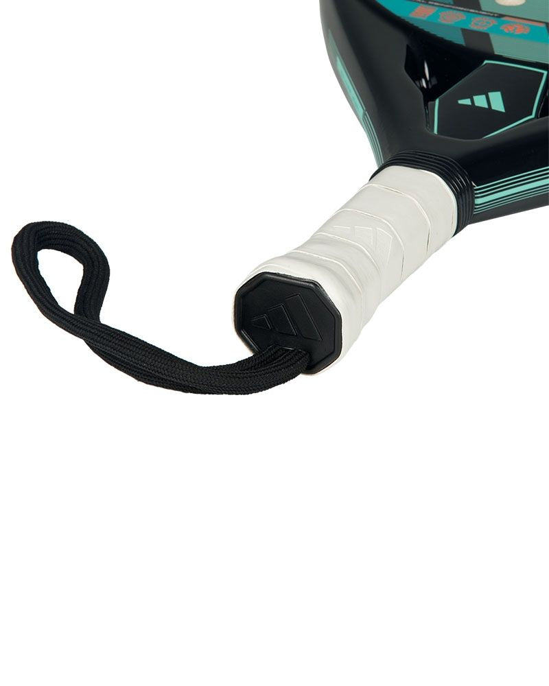 The handle of an Adidas padel racket with green and black design on a white background.