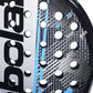 The face of a blue, white and black Babolat padel racket on a white background.