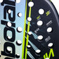 The face of a blue and yellow 2026 Babolat padel racket on a white background.