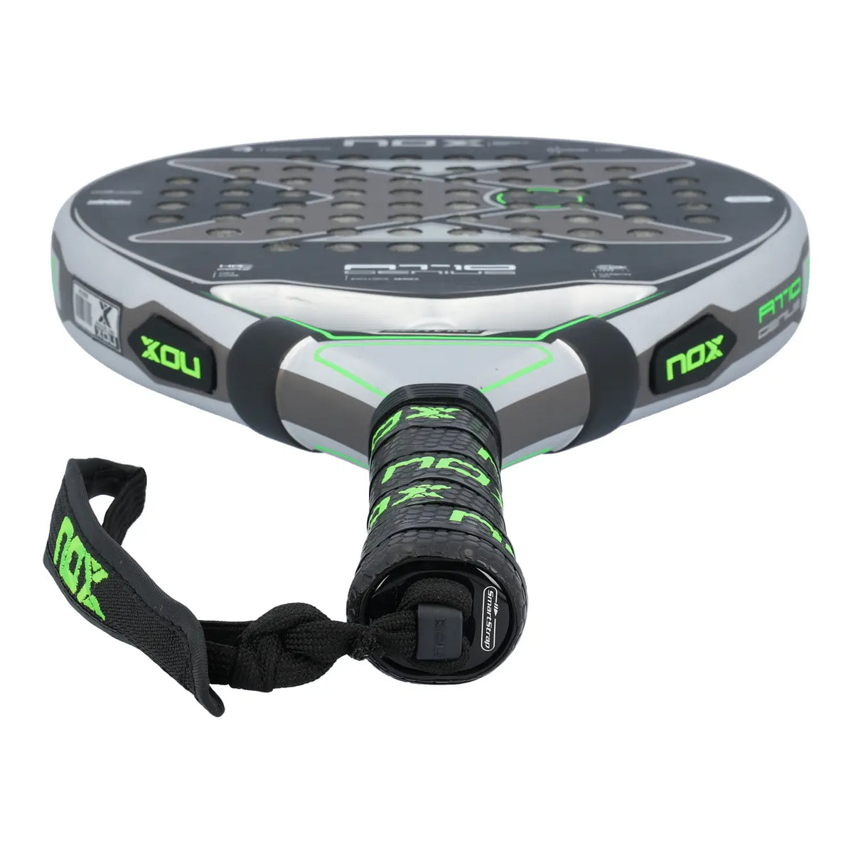 The handle of a Nox AT10 padel racket with a silver and lime green design on a white background.