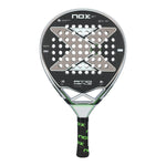 A Nox AT10 padel racket with a silver and lime green design on a white background.