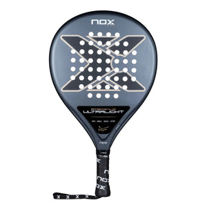 A grey Nox 2026 padel racket with bronze detailing on a white background.