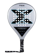 Grey Nox padel racket with black and blue branding on a white background.
