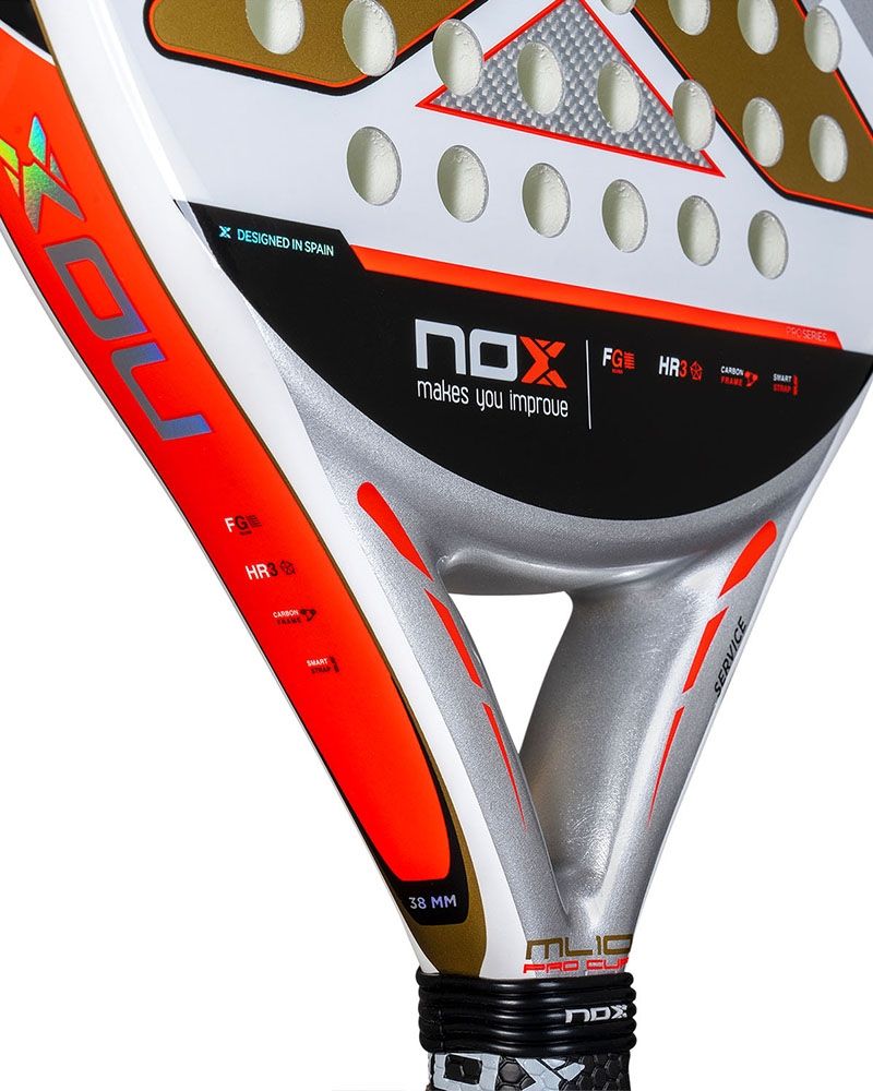 Close up of a white and gold Nox padel racket with orange branding, on a white background.