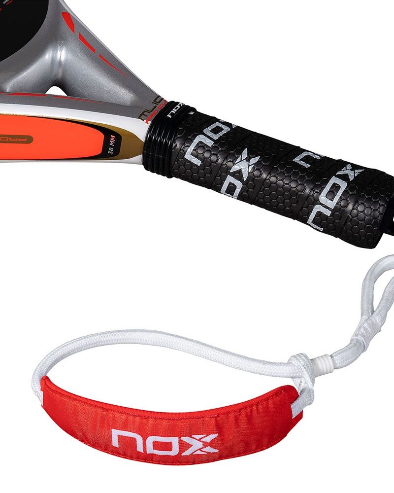 The handle of a white and gold Nox padel racket with orange branding, on a white background.