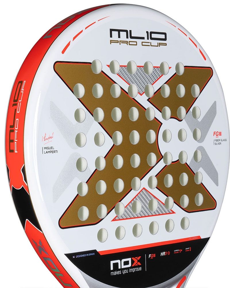 The face of a white and gold Nox padel racket with orange branding, on a white background.