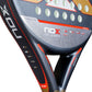 Close up of a Nox ML10 padel racket with a rough surface on a white background.