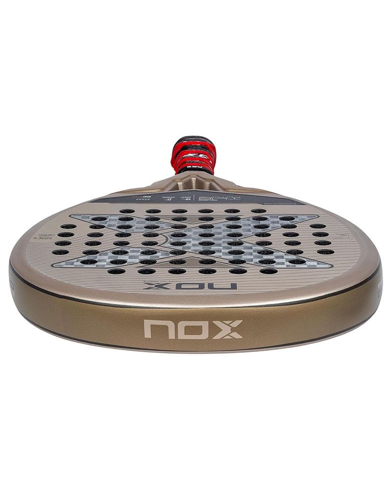The top of a gold Nox Future padel racket on a white background.