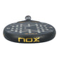 The top of a black and gold Nox Ultimate padel racket on a white background.