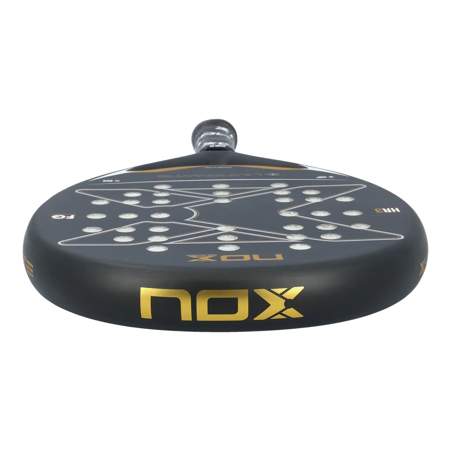 The top of a black and gold Nox Ultimate padel racket on a white background.