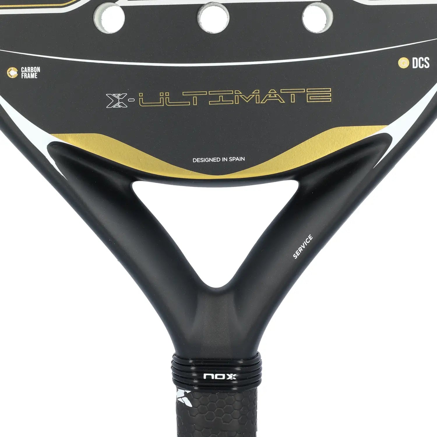 A close up of a black and gold Nox Ultimate padel racket on a white background.