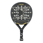 A black and gold Nox Ultimate padel racket on a white background.