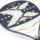 The face of a blue and pink Nox Ultimate padel racket on a white background.