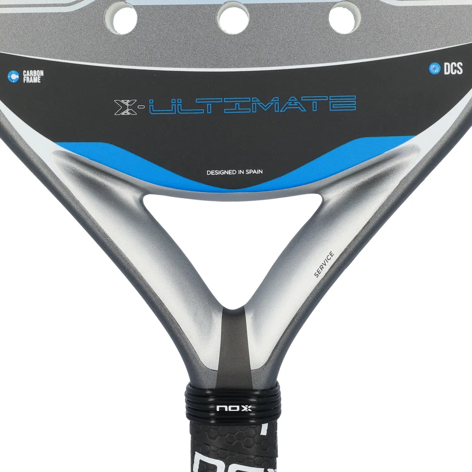 A close up of a grey and blue Nox Ultimate padel racket on a white background.