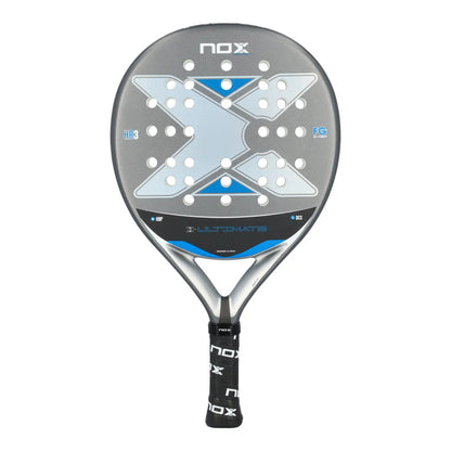 A grey and blue Nox Ultimate padel racket on a white background.
