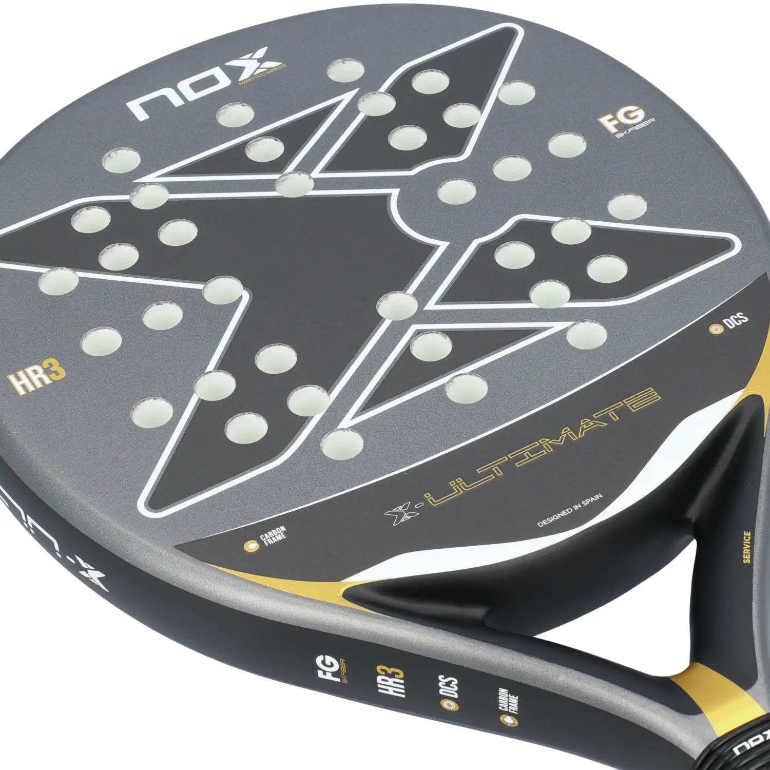 The face of a grey and gold Nox Ultimate padel racket on a white background.