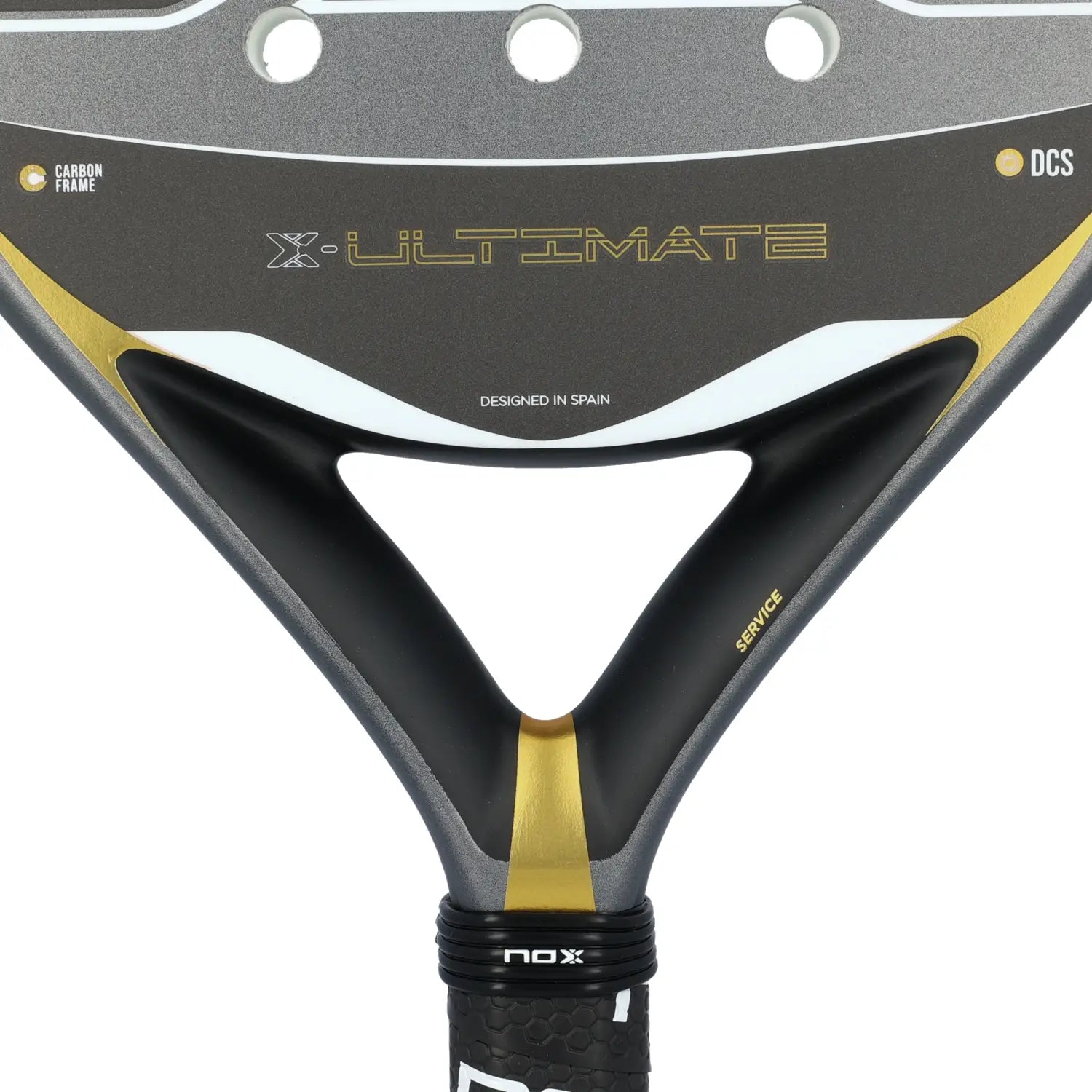 A close up of a grey and gold Nox Ultimate padel racket on a white background.