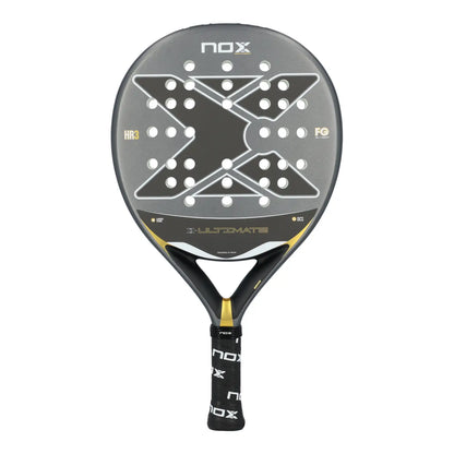 A grey and gold Nox Ultimate padel racket on a white background.