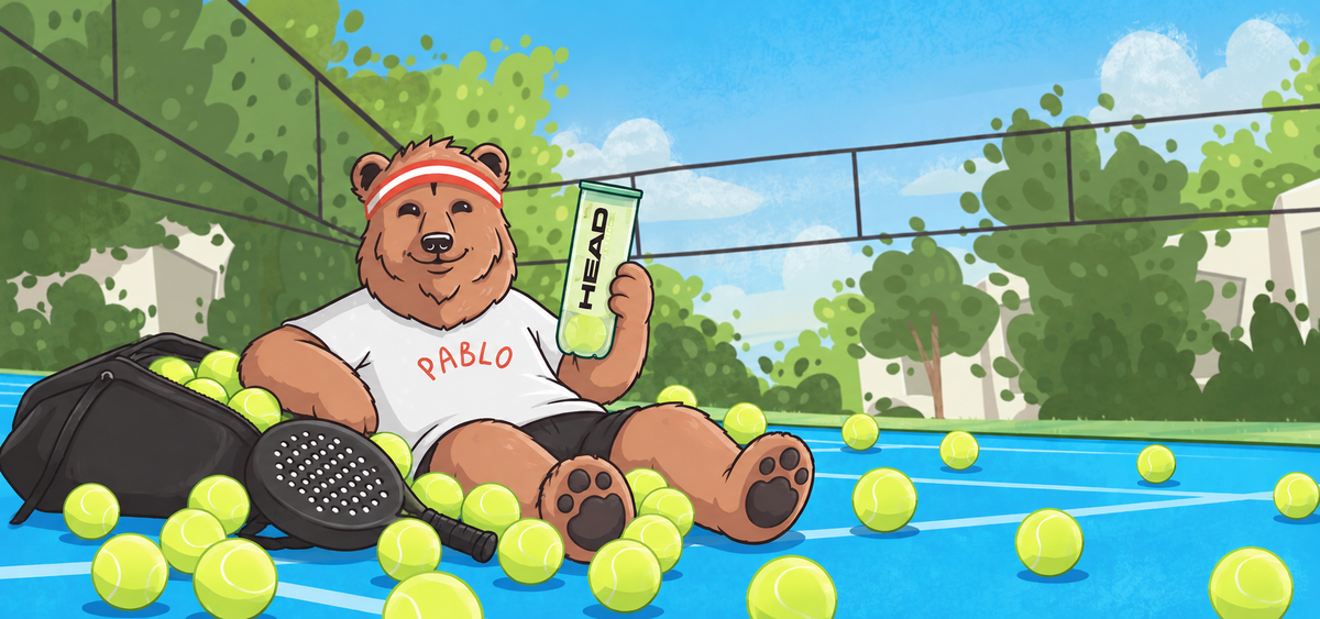 Pablo the Padel Bears mascot on a blue padel tennis court surrounded by HEAD Padel One balls.