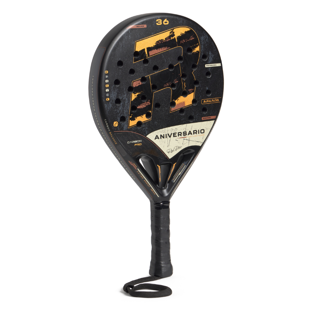 Black and gold Royal Padel Anniversario padel racket on a white background.