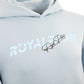 Close-Up of Light blue hoodie with Royal Padel branding on a white background