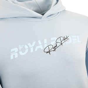 Close-Up of Light blue hoodie with Royal Padel branding on a white background