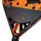 Close-up of a black and orange padel racket with 'R TRIAL' branding on a white background