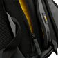 Close up of a grey Volt padel backpack, showing the zip and yellow detail