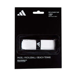 A white Adidas padel tennis racket grip in black packaging on a white background.