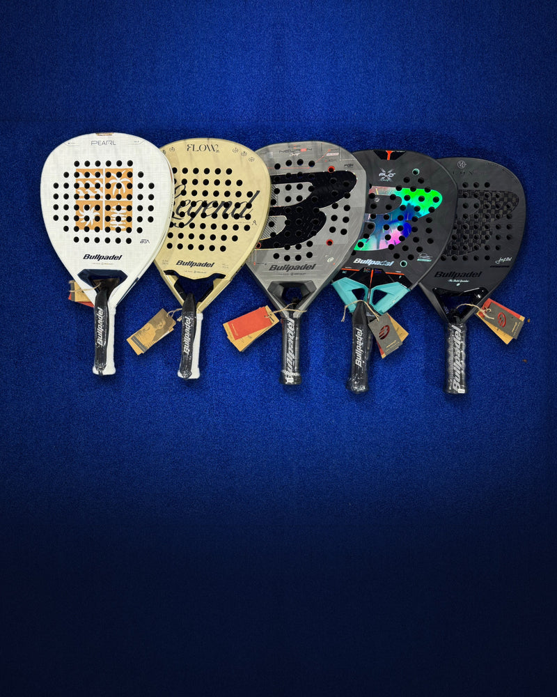 The Bullpadel 2027 racket range on a blue padel court.